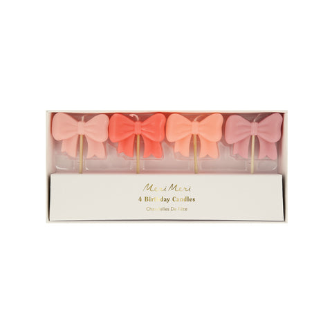 Pink bow candles